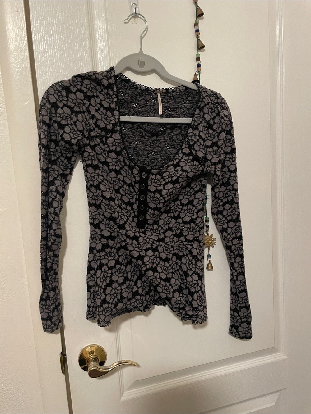 Juliette Barnes' Free People Floral Lace Top